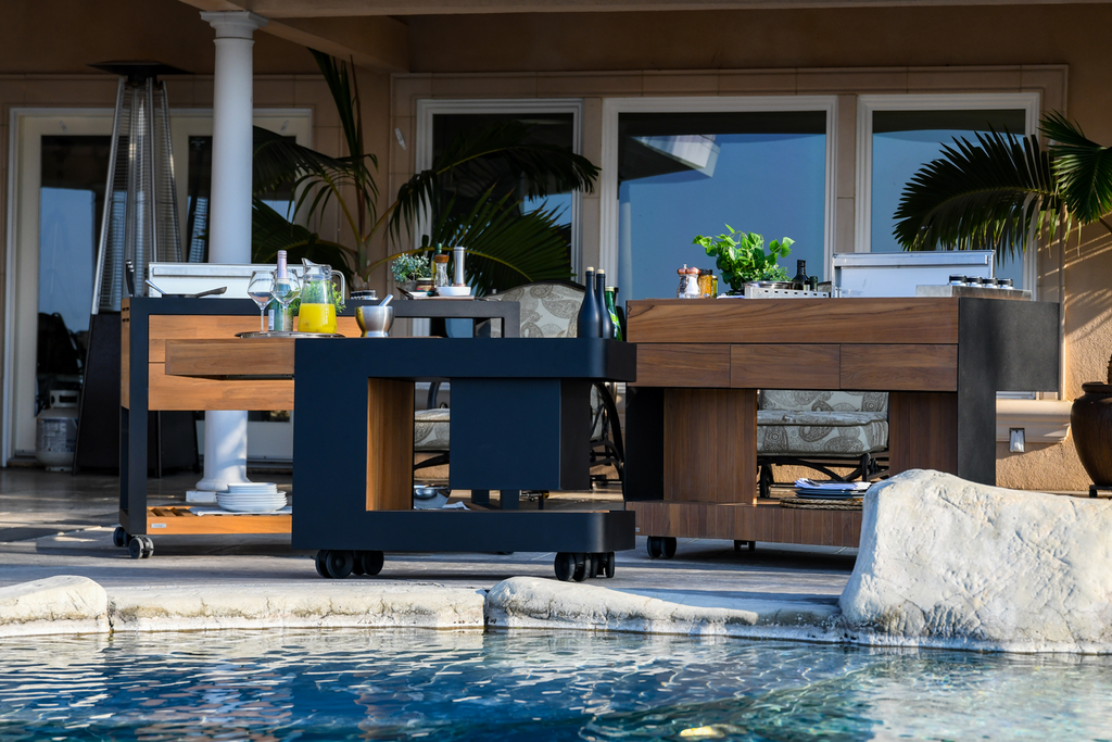 Indu+ Cart Collection on display by the pool, presenting the complete lineup of stylish and versatile carts. These carts offer endless possibilities for outdoor cooking and entertaining, making your backyard the ultimate culinary destination.